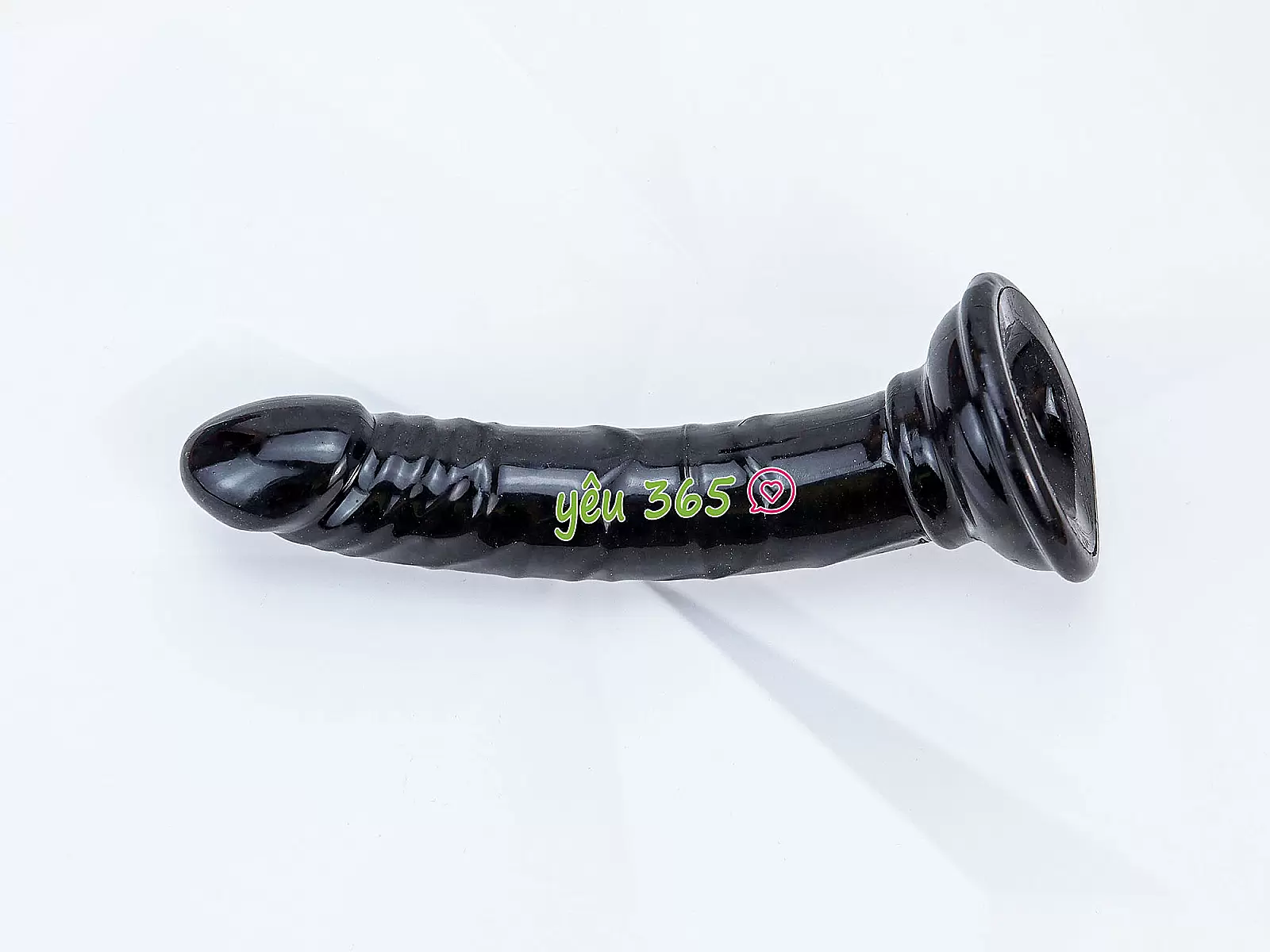 Dương vật giả có đế uốn cong silicon màu đen