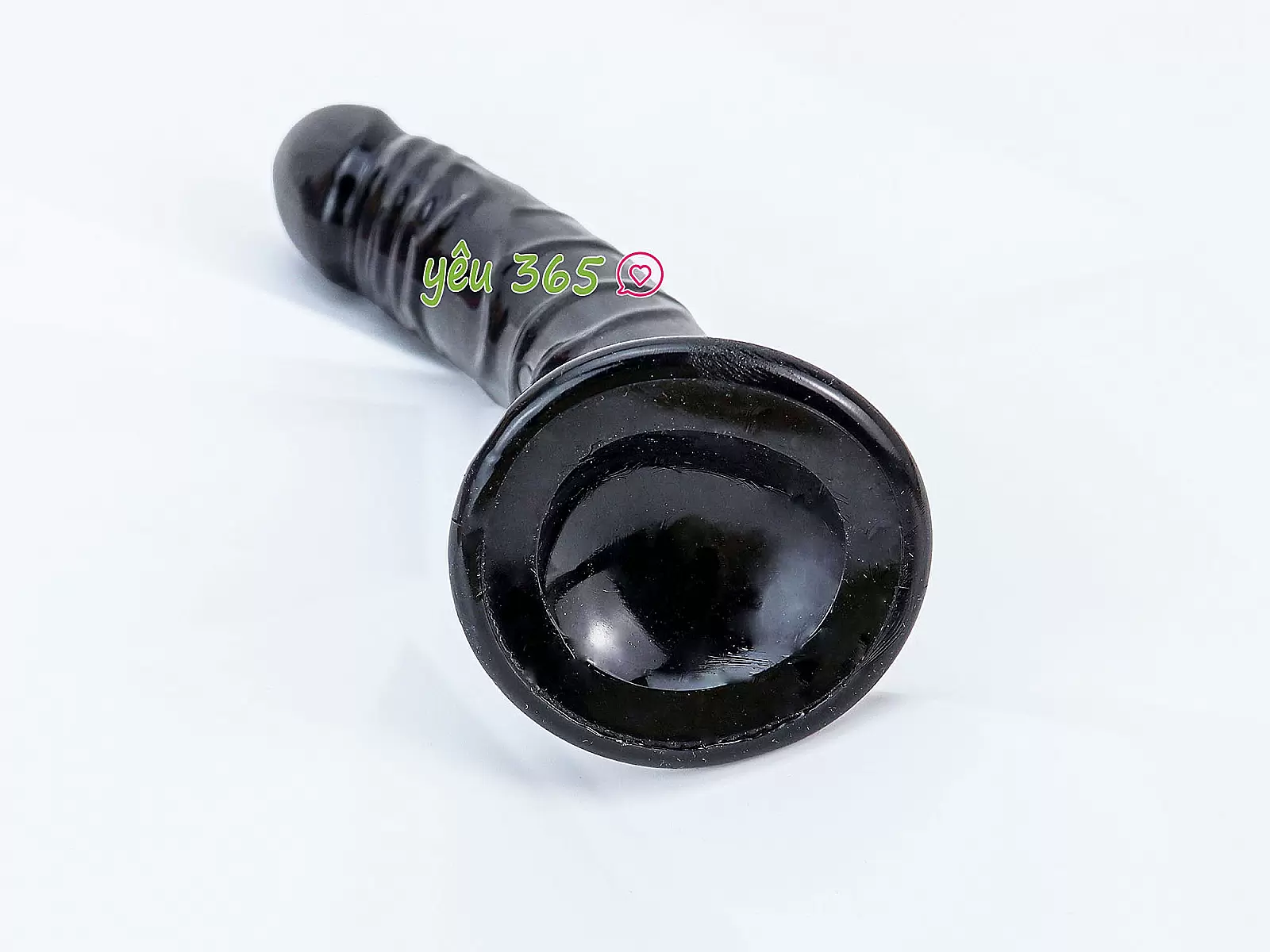 Dương vật giả có đế uốn cong silicon màu đen