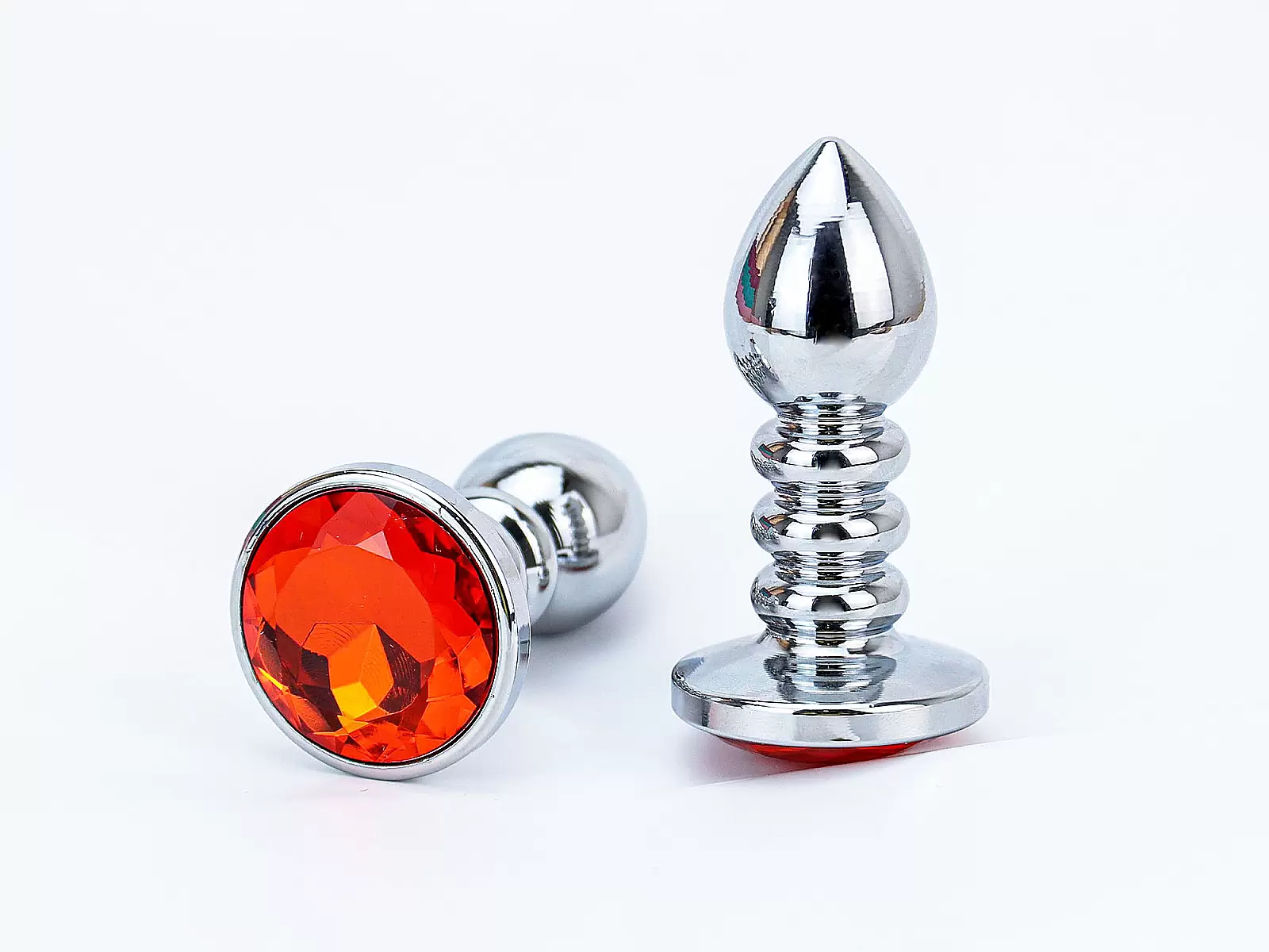 Đồ chơi kích hậu Inox xoắn ốc đuôi pha lê màu cam